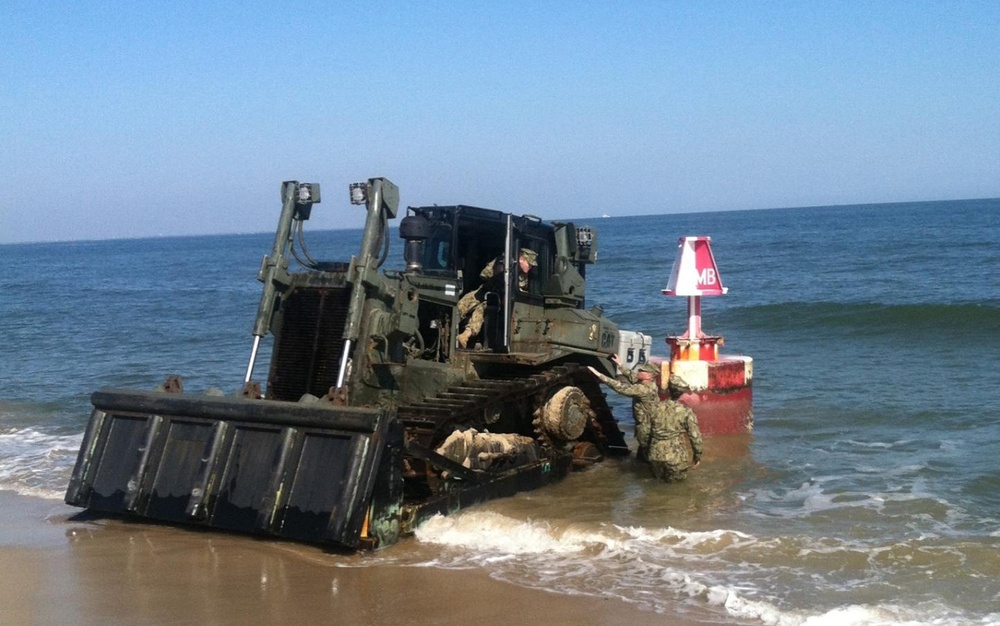 Coast Guard, Navy remove aground buoy