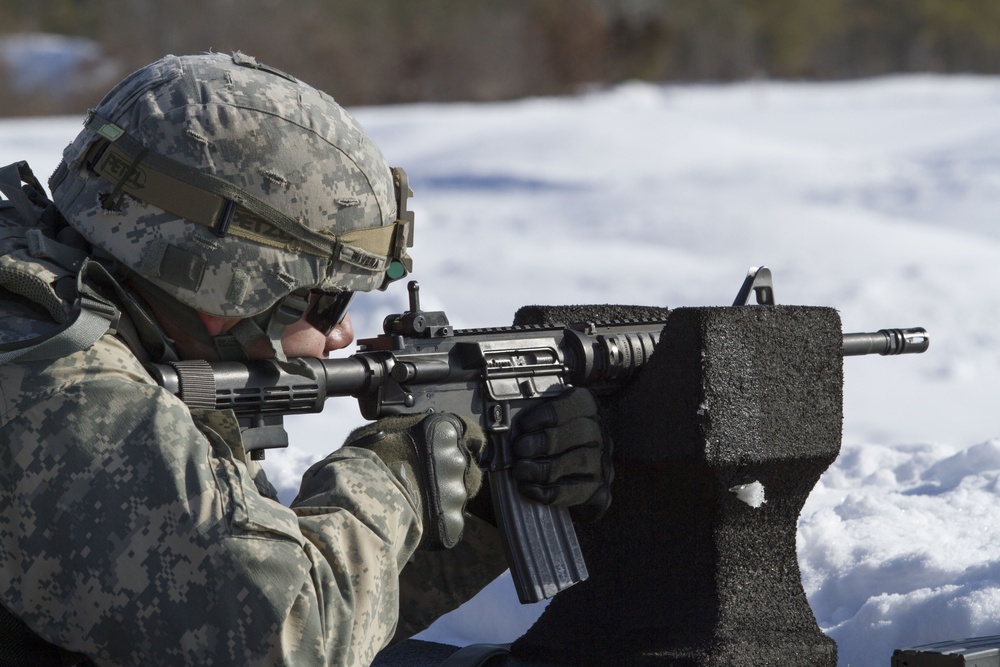 Sgt. Rivera and his M4A3 carbine rifle at weapons qualification for the Best Warrior Competition