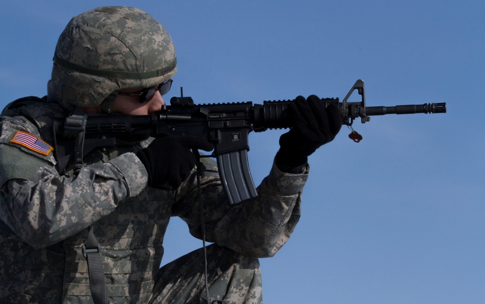 Sgt. Vargas fires rifle at Wweapons qualification for Best Warrior Competition.