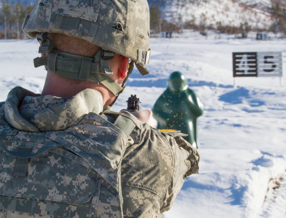 Staff Sgt. Dershem engages enemy targets at weapons qualification for Best Warrior Competition