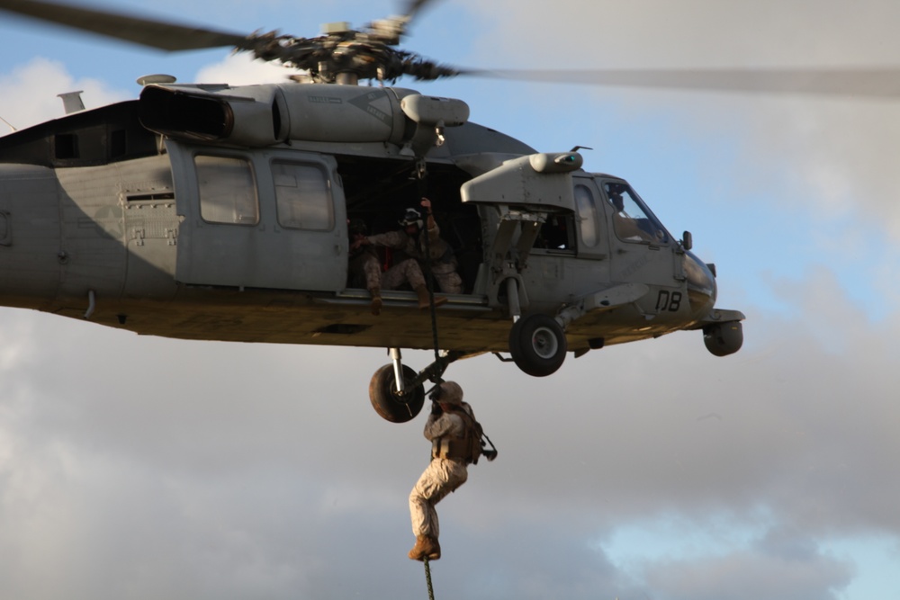 Marines fast-rope during Guahan Shield