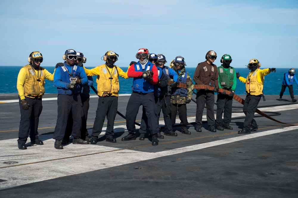 USS Dwight D. Eisenhower sailors drill