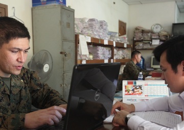 US sailors help organize files during Cambodia MEDEX 13-1