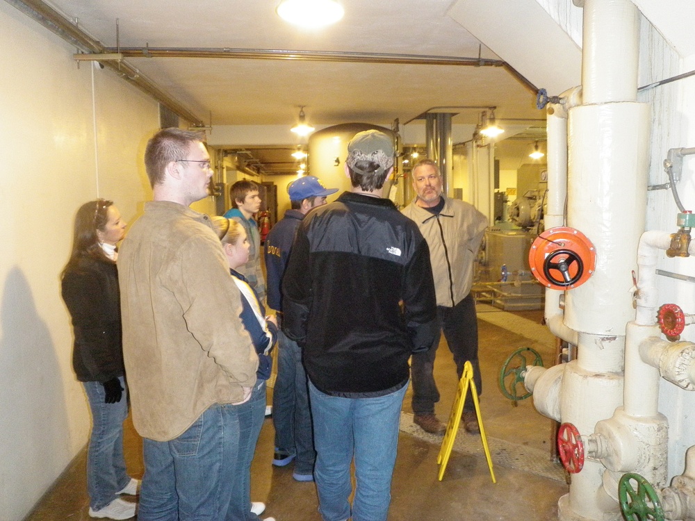 Ben Bremer gives a group of Mountain Home High School students a tour of the Norfork Dam hydropower plant as part of the school’s annual mentorship field day