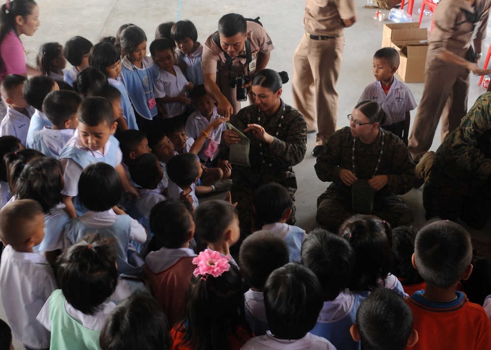 U.S. Marines, sailors bring smiles to Thai students during Cobra