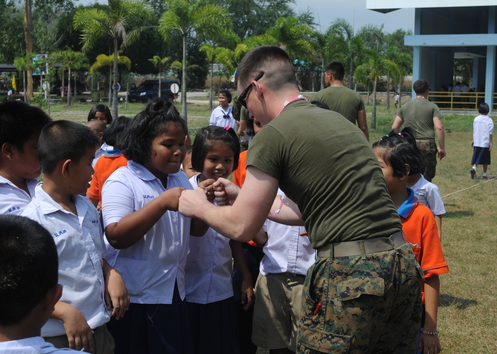 U.S. Marines, sailors bring smiles to Thai students during Cobra