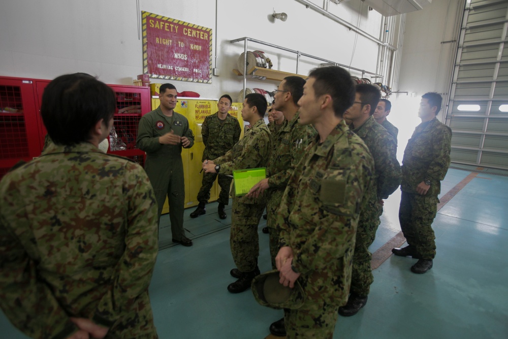 Japan Ground Self Defense Force soldiers tour Marine Corps Air Station Iwakuni, Japan, Aircraft Rescue Firefighting facilities.