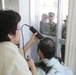 A Japan Ground Self Defense Force soldier receives a haircut at the northside barbershop during a recent visit