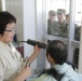 A Japan Ground Self Defense Force soldier receives a haircut at the northside barbershop during a recent visit