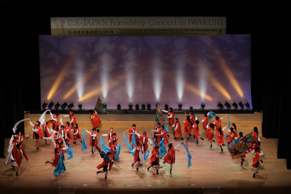 American and Japanese students perform a traditional dance during the U.S.-Japan Friendship Concert at Sinfonia Iwakuni, March 2, 2013.