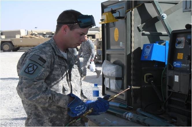 Soldier prepares for welding job