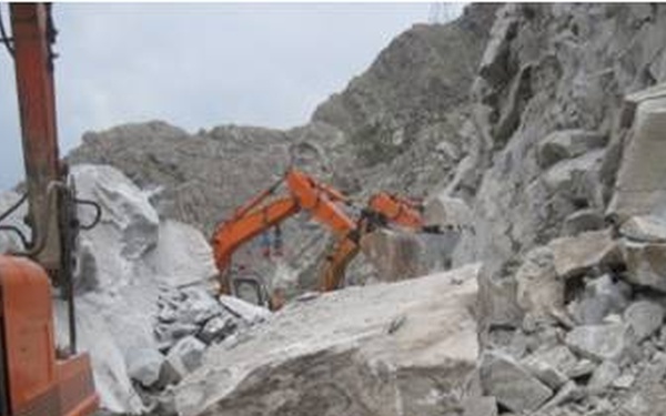 Afghan construction crew clears massive rock slide, reopening key roadway