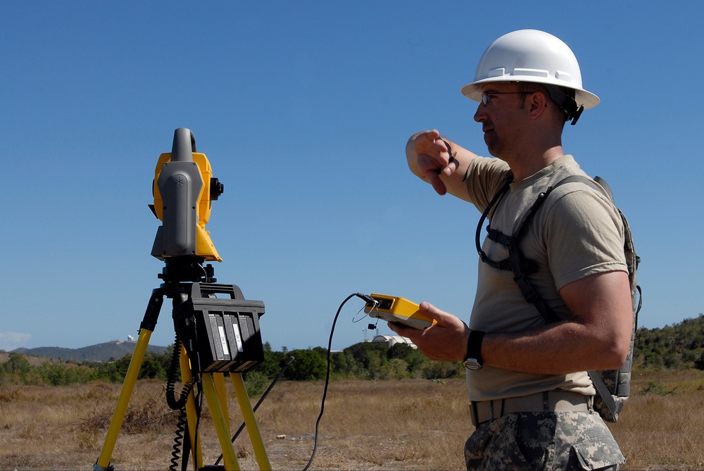 Missouri Guardsmen assist in surveying land for humanitarian response exercise at Guantanamo Bay.