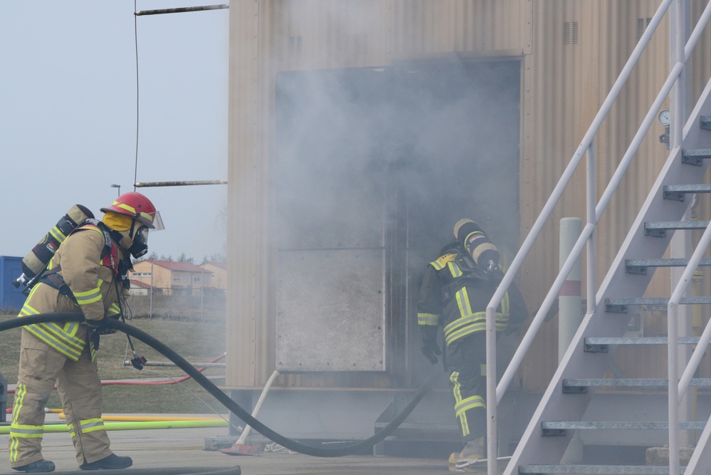 Civilian firefighters from US Army Garrison Ansbach Fire Department train
