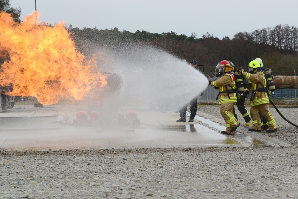 Civilian firefighters from US Army Garrison Ansbach Fire Department train