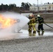 Civilian firefighters from US Army Garrison Ansbach Fire Department train