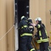 Civilian firefighters from US Army Garrison Ansbach Fire Department train