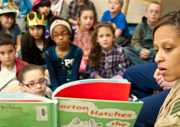 Troops read Dr. Seuss books to Taunton Elementary School students