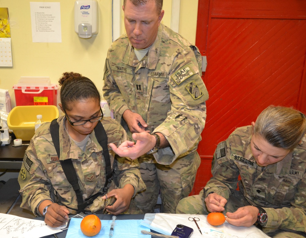 Hands-on training keeps deployed medics current with clinical procedures