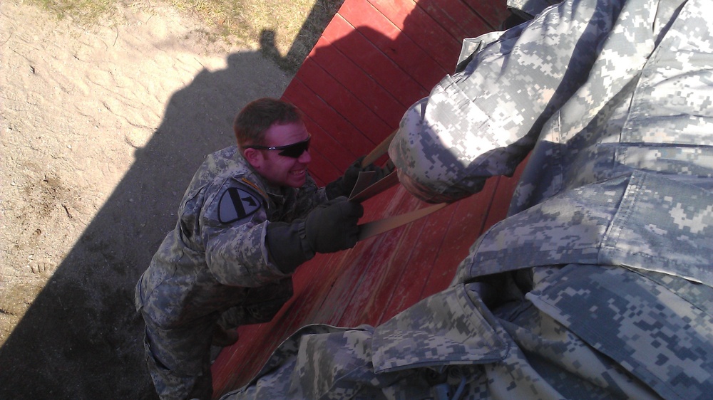 152nd Cav troops tackle team-building obstacle course