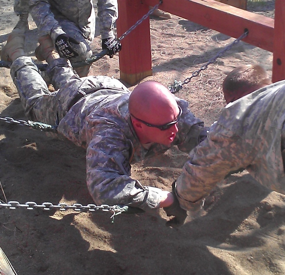 152nd Cav troops tackle team-building obstacle course