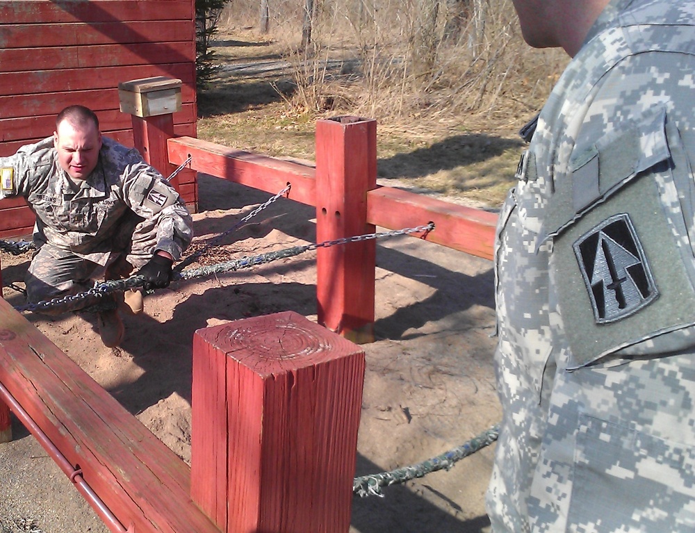 152nd Cav troops tackle team-building obstacle course