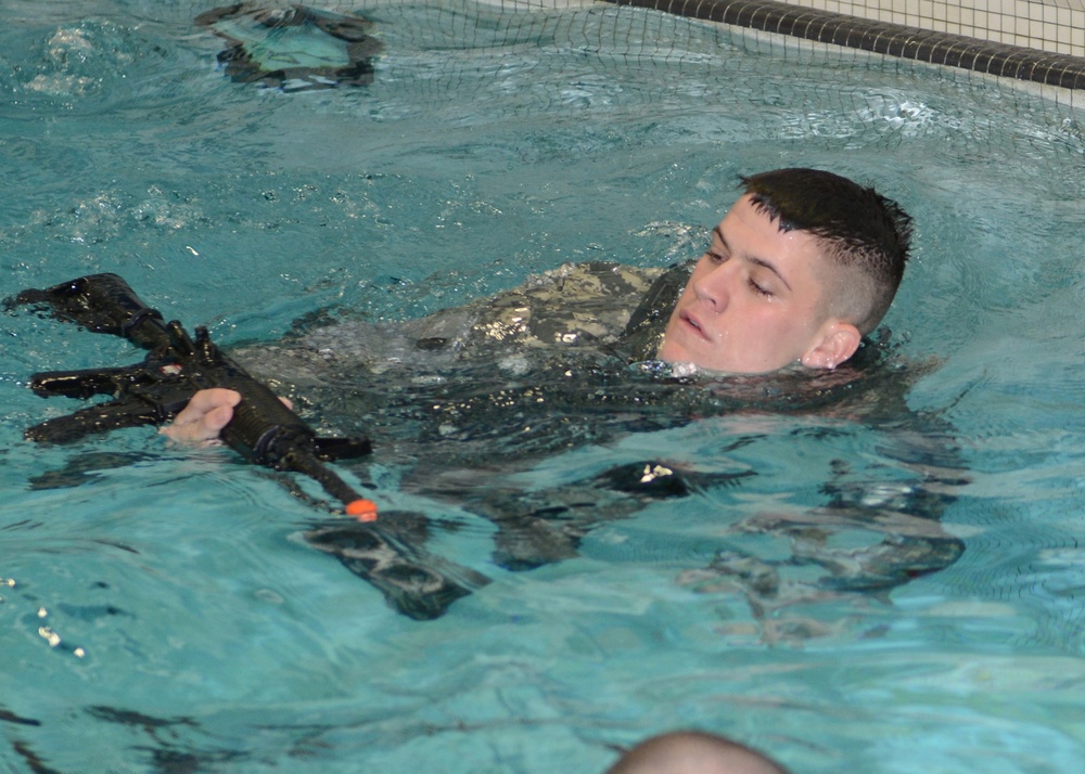 Cavalry soldiers perform during combat water survival test