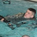 Cavalry soldiers perform during combat water survival test