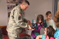 Girl Scouts visit 55th Signal Company (COMCAM)