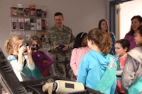 Girl Scouts visit 55th Signal Company (COMCAM)