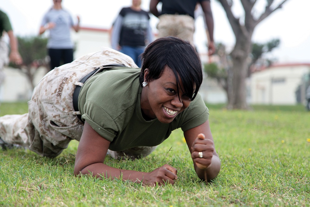 Spouses train as Marines during Jane Wayne day