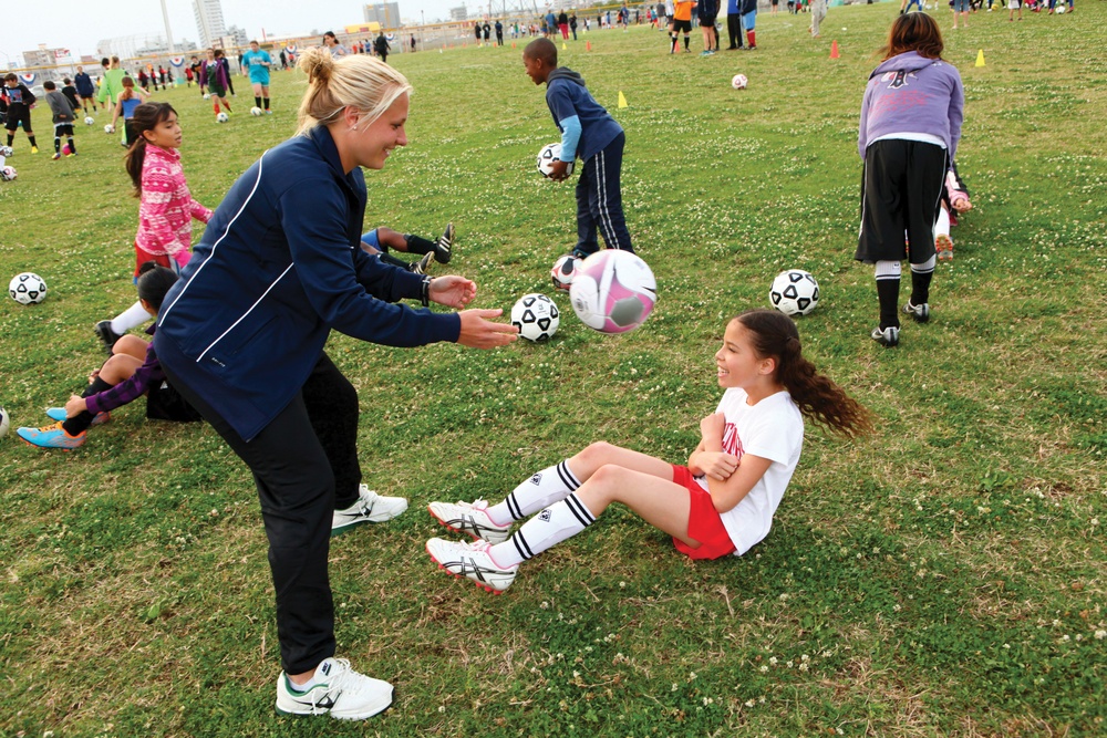 Children sharpen soccer skills during clinic