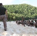 Marines PT on the beach during Exercise Gauhan Shield