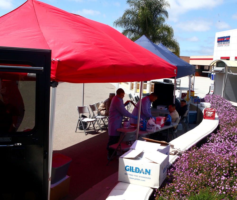 Marines, sailors, families give blood for military members