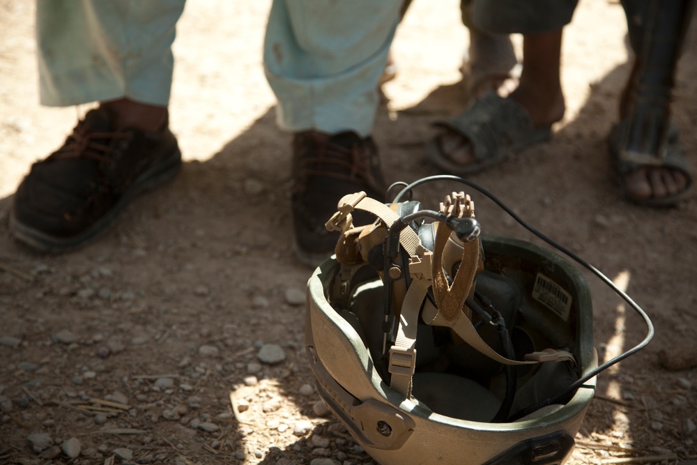 MARSOC provides over watch for ANASF assisting with Local Police checkpoint