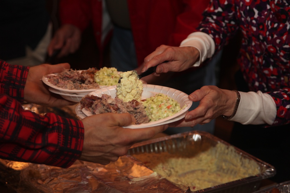 Community shares tradition, hospitality with station Marines