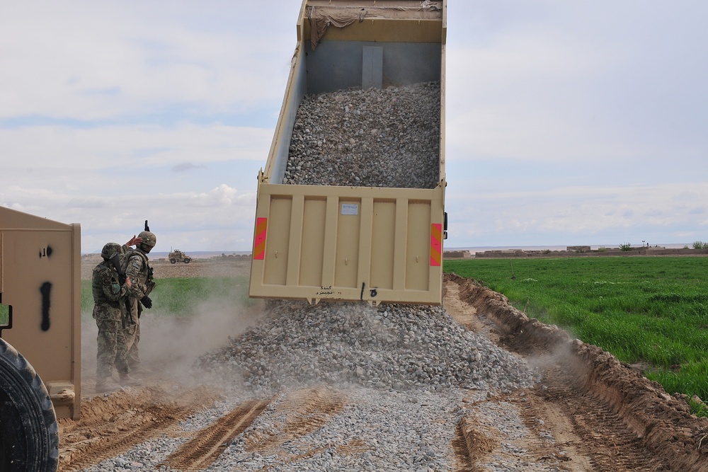 US, Afghan engineers build road through 'Taliban center of mass'