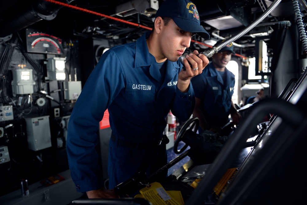 USS William P. Lawrence sailor stands watch
