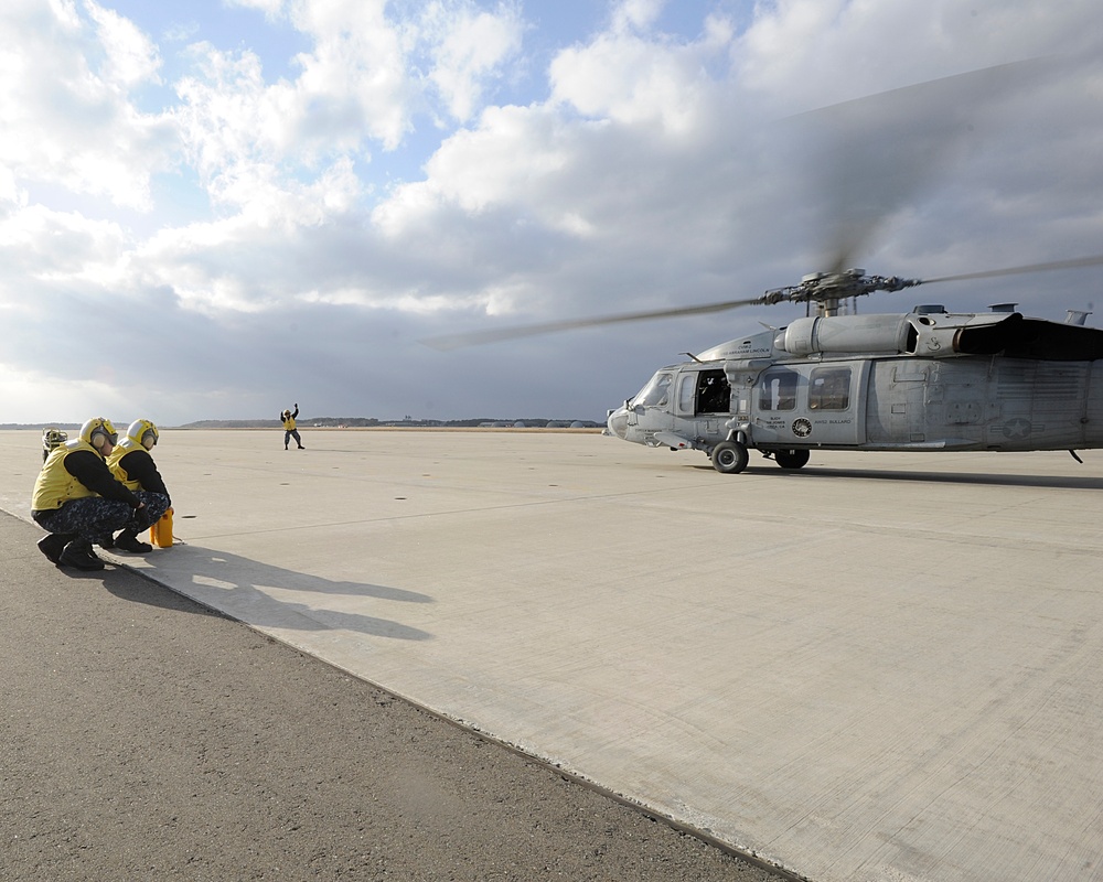 NAF Misawa sailors working on flight ramp
