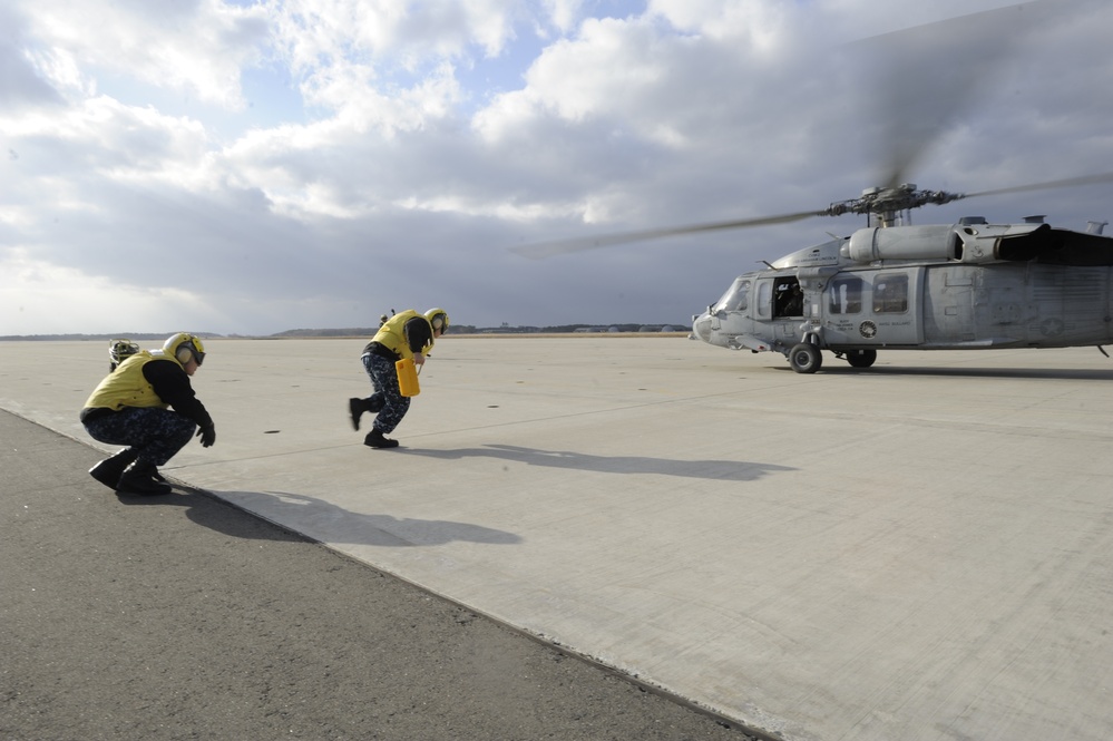 NAF Misawa sailors working on flight ramp