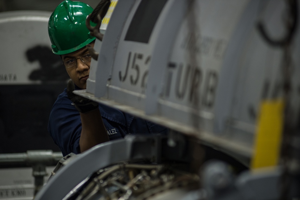 USS Nimitz sailor at work