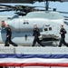 USS Arlington sailors prep to man the rails