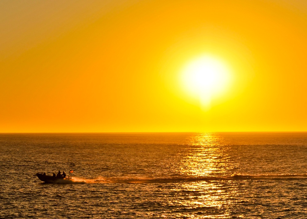 USS Nimitz at sunset