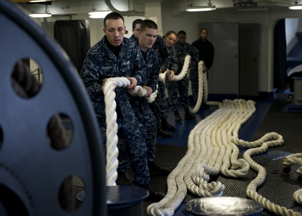 USS Nimitz sailors prep to moor lines
