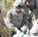 Sailor treats simluated wounds during Army Combat Lifesaver training