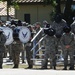 MTI's bow their heads during BMT Coin Ceremony