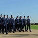 US Air Force BMT conduct pass and review during graduation parade