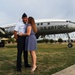 Girlfriend kisses airmen after BMT graduation prade