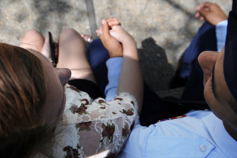 USAF BMT graduate holds his girlfriends hand at The Alamo