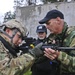 Retired police officers teach marksmanship to CID agents